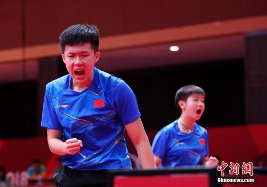 資料圖：雅加達亞運會，王楚欽/孫穎莎奪得混雙冠軍。 <a target='_blank' href='/'>中新社</a>記者 劉關(guān)關(guān) 攝