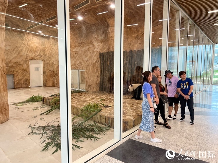 當(dāng)?shù)赜慰团c“四?！焙嫌?。人民網(wǎng)記者 張志文攝